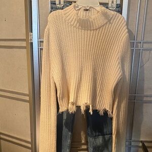 Cream Knit Cropped Sweater and patch blue jeans